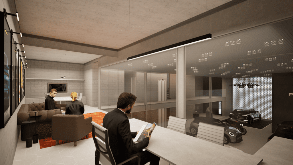 Uma sala moderna e minimalista com um homem lendo em uma mesa com vista para uma garagem. Duas pessoas sentam em um sofá marrom, conversando. A garagem abaixo é visível através do vidro, exibindo dois carros de luxo e uma motocicleta. O espaço é elegante, com paredes cinzas e um tapete vermelho adicionando calor. - Luiz Volpato Arquitetura